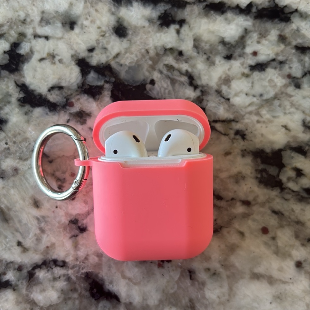 Apple AirPod first generation with charging case.